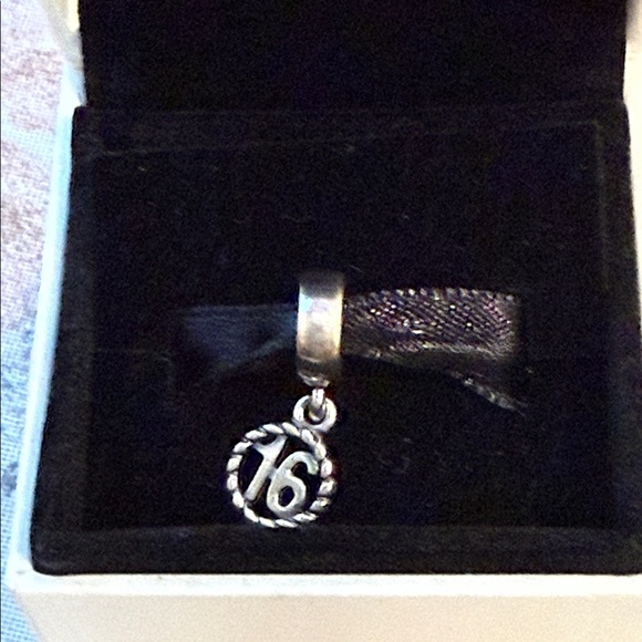 Pandora Jewelry - Pandora Silver 16th birthday charm never taken out of the box.